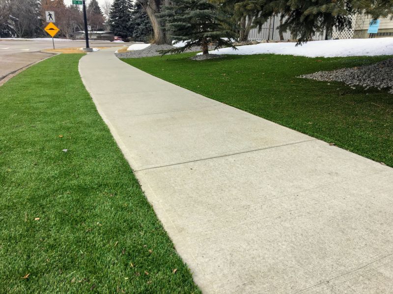 Curb and Sidewalk Completion